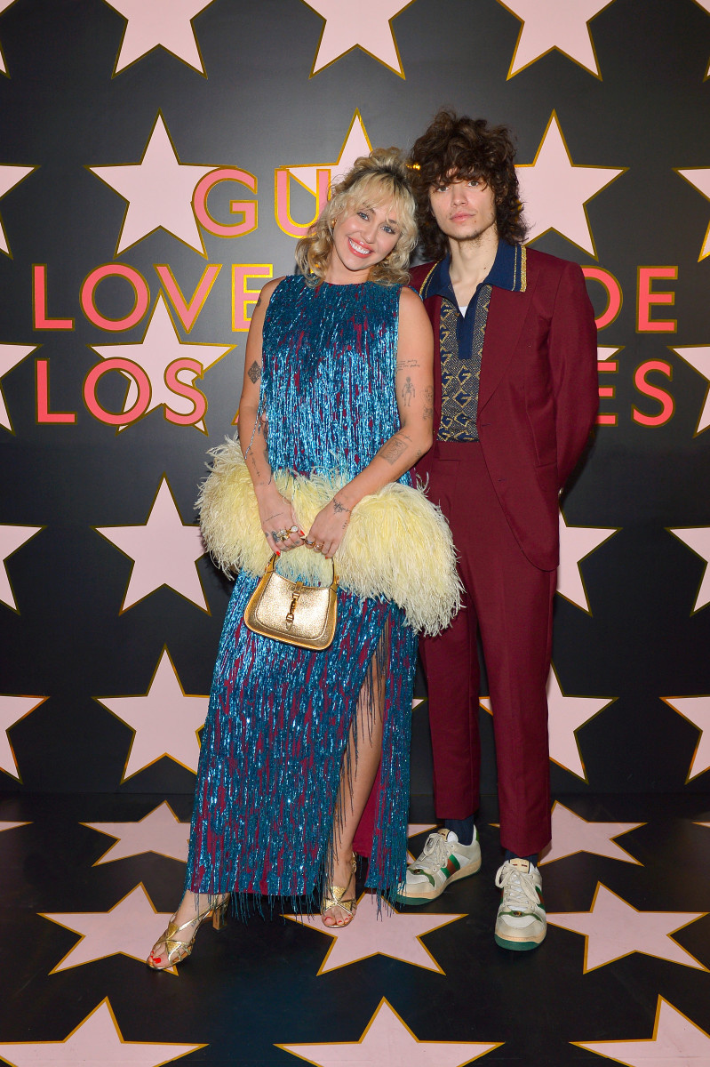   Miley Cyrus ir Maxxas Morando atvyksta į „Gucci Love Parade“ 2019 m. lapkričio 2 d. Los Andžele, Kalifornijoje. (Nuotrauka Donato Sardella / Getty Images for Gucci)