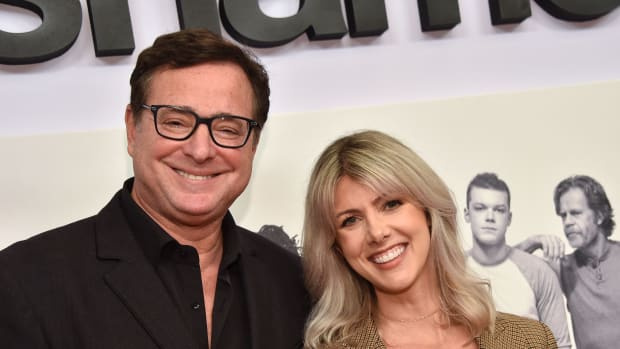  Aktorius Bobas Saget ir jo žmona žurnalistė Kelly Rizzo atvyksta į serialą „Showtime“."Shameless" FYC red carpet event at the Linwood Dunn theatre in Hollywood on March 6, 2019. (Photo by Chris DELMAS / AFP) (Photo by CHRIS DELMAS/AFP via Getty Images)