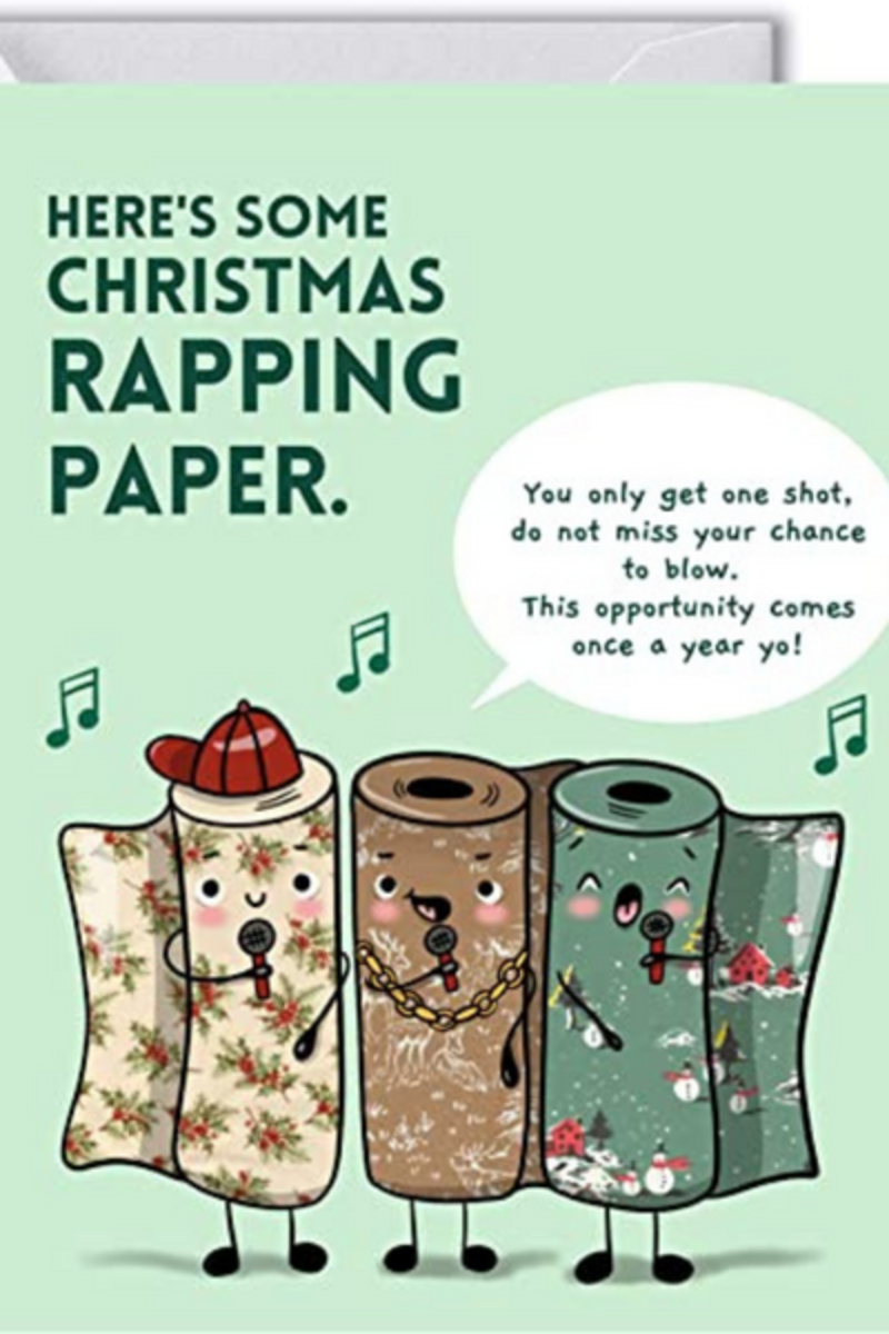   Lustige Weihnachtskarten, die auf Papier klopfen