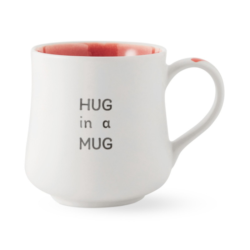   Williams Sonoma-Umarmung in einer Kaffeetasse